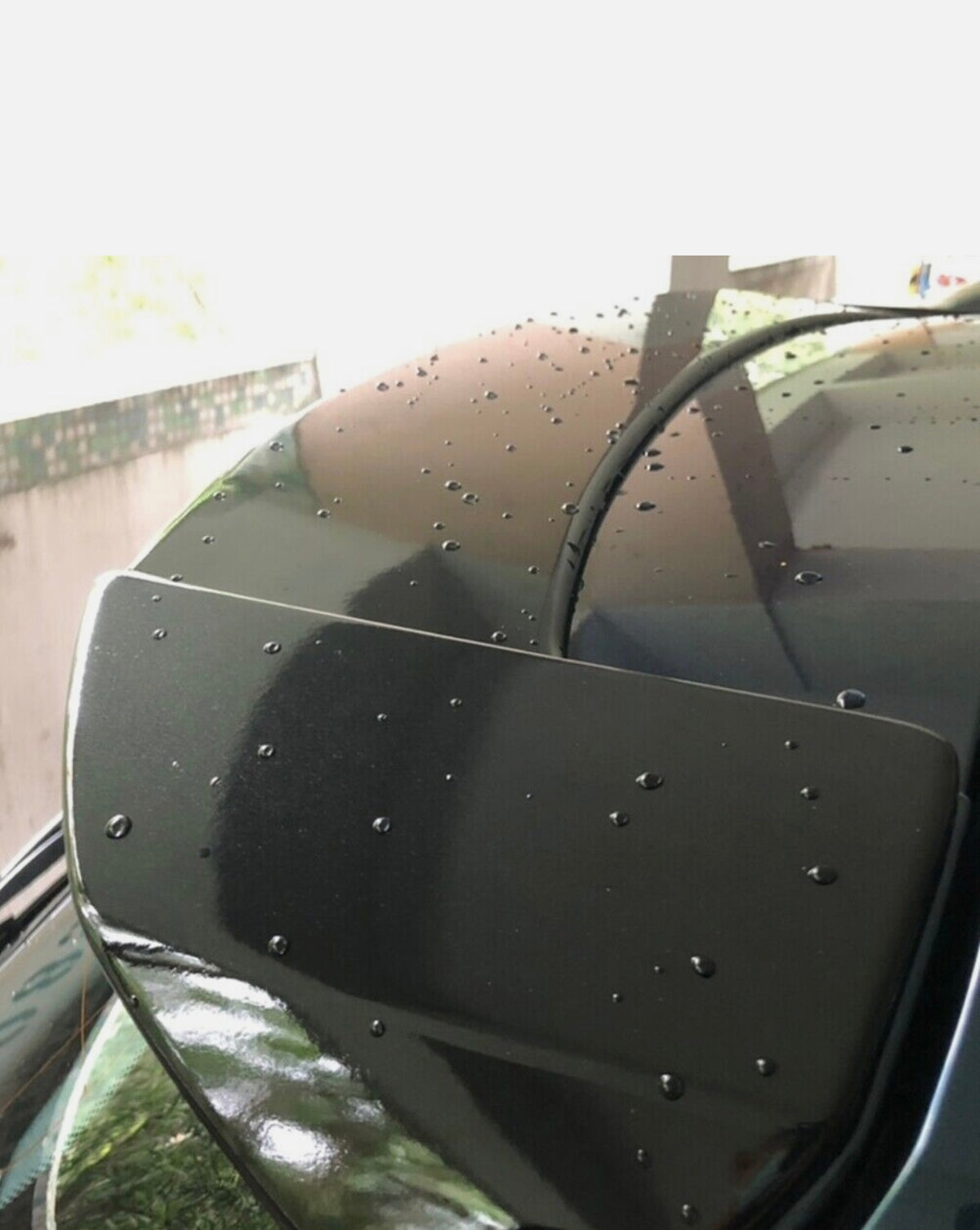 BMW E81 / E87, vm.07-12 Kiiltävän
musta takaspoileri